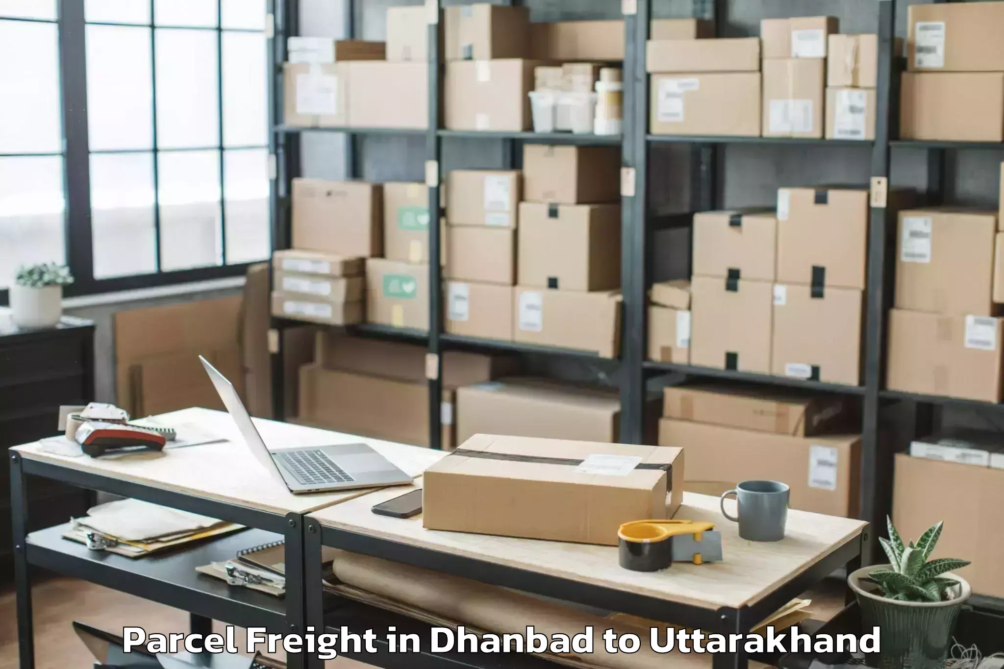 Book Dhanbad to Mussoorie Parcel Freight Online